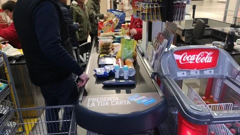 Row in front of a supermarket counter Stock Footage 102184864