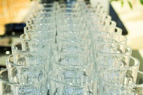 Row of glass kitchen dinnerware Stock Photos