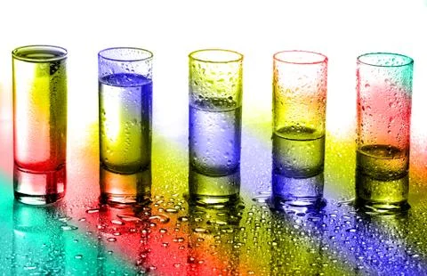 A row of glasses for vodka Stock Photos