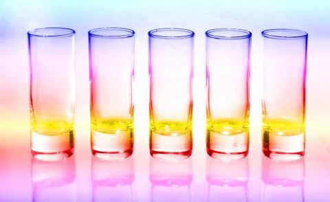 A row of glasses for vodka Stock Photos