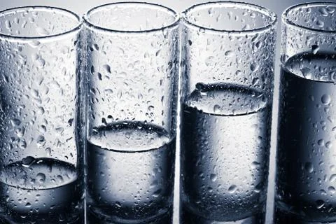 Row of glasses for vodka Foto stock