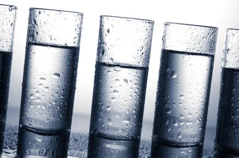 Row of glasses for vodka Foto stock