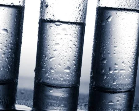 Row of glasses for vodka Foto stock