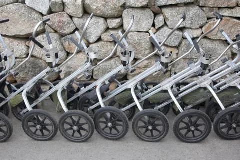 Row of golf pull carts Stock Photos
