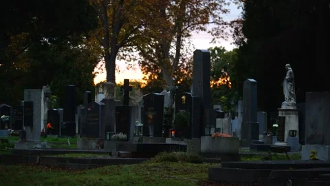 Row of Gravestones in front of sunset Video stock 145810791