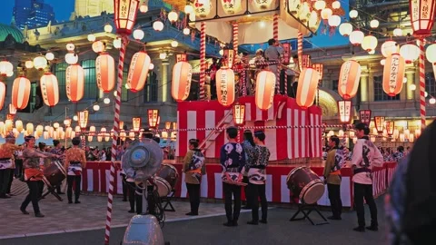 Row of Happi Coat Drummers Standing at Festival Tower Base Stock Footage 345817020