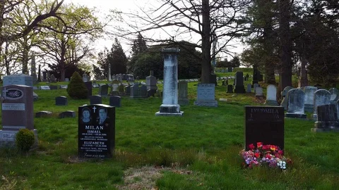 Row of headstones in graveyard Stock Footage 129276534