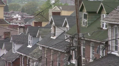 ROW HOMES ROOFTOPS POWER LINES Stock Footage 63074666