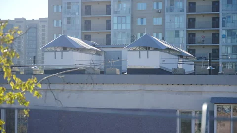 Row of homes with spacious balconies and gently sloping roof Видео 332117116