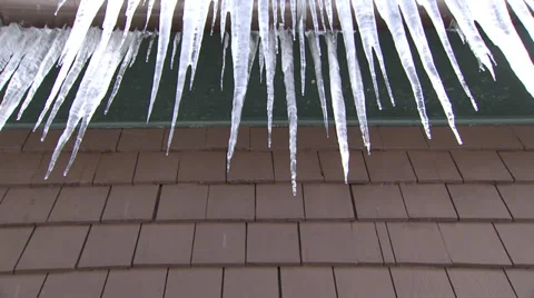 A Row of Icicles Look Like the Abominable Snowman's Mouth Stock Footage 35362520