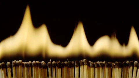 Row of igniting matches, Ultra Slow Motion Stock Footage 86576057