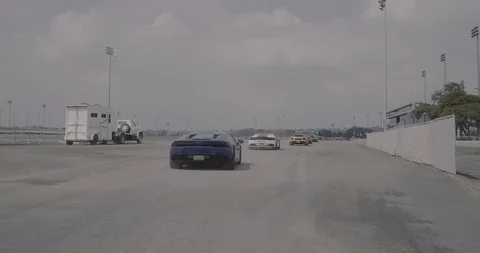 Row of Lamborghinis driving Stock Footage 105122494
