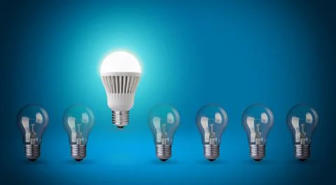 Row with light bulbs and led bulb. idea concept on blue background Stock Photos