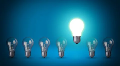 Row of light bulbs.idea concept on blue background. Stock Photos