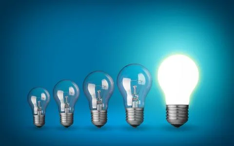 Row of light bulbs.idea concept on blue background. 库存照片