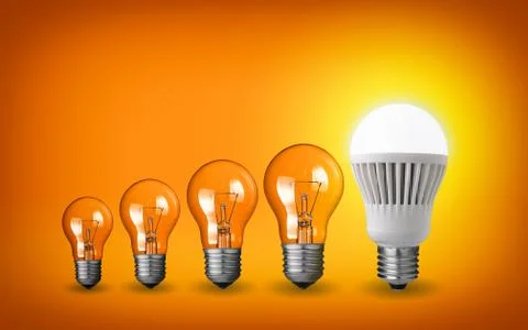 Row of light bulbs.idea concept on orange background. Stock Photos