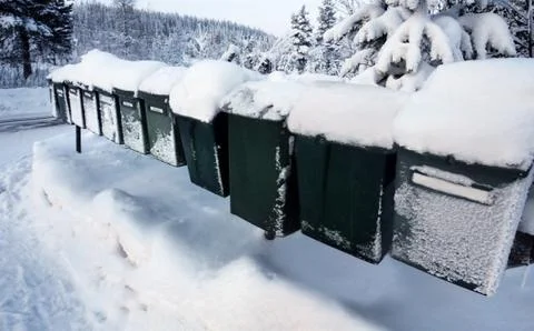 Row of mail boxes in  winter Stock Photos