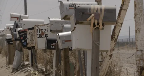 Row of Mailboxes Pan Right Stock Footage 89942002