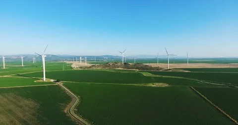 Row of modern wind turbines generating clean and renewable energy. 4k Stock Footage 97103184