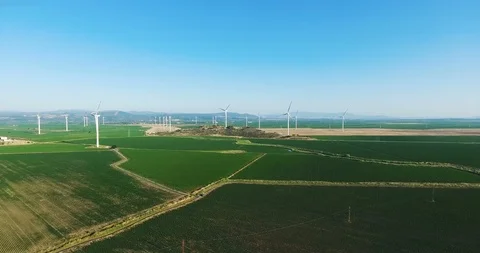 Row of modern wind turbines generating clean and renewable energy.4k Stock Footage 97103415