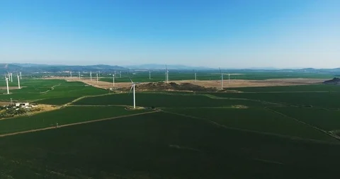 Row of modern wind turbines generating clean and renewable energy.4k Stock Footage 97103925