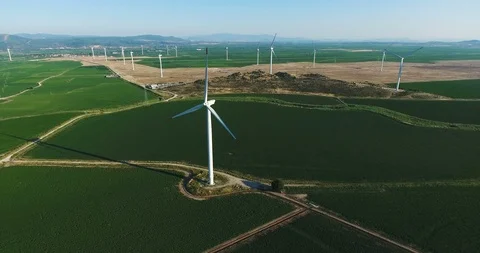 Row of modern wind turbines generating clean and renewable energy.4k Stock Footage 97104148