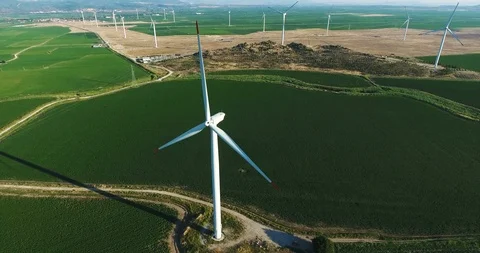 Row of modern wind turbines generating clean and renewable energy.4k Stock Footage 97104194