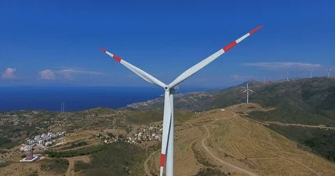 Row of modern wind turbines generating clean and renewable energy.4k Stock Footage 97104352
