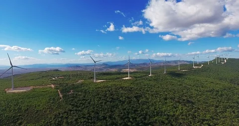 Row of modern wind turbines generating clean and renewable energy . 4k 動画素材 97928888