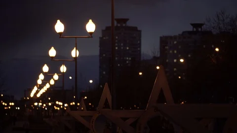 A row of night lights in Moscow empty park during quarantine Video stock 128591518