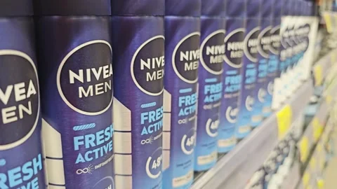 Row of Nivea Men Fresh Active deodorant spray cans on a supermarket store shelf. Stock Footage 338259113