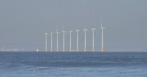 Row of offshore windturbines Stock Footage 127422348