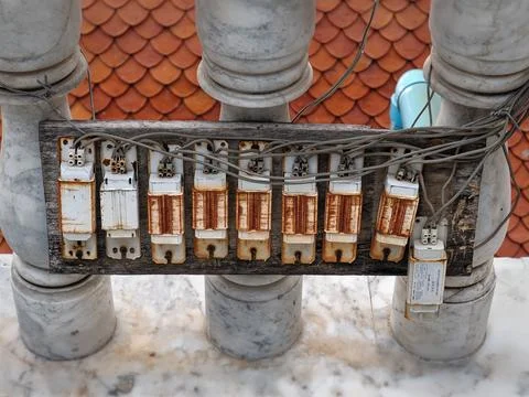 Row of Old Rusty Conventional Ballasts for Lighting Stock Photos