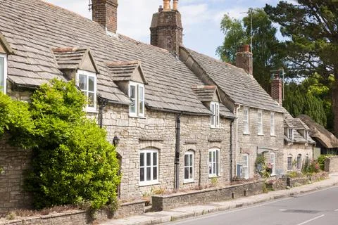 Row of old stone cottages in Corfe Castle Village, Dorset, UK Stock Photos
