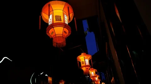 A row of palace lanterns at night in Yu Garden Shanghai Stock Footage 124442852
