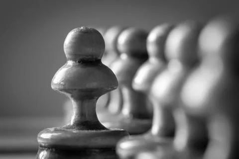 A row of pawns Stock Photos