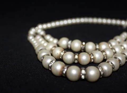 Row of Pearl strings abstract background Foto stock