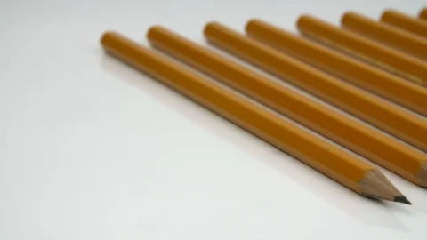 A row of pencils on a white surface Stock Footage 88666225
