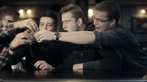 Row of people drinking at a bar Stock Footage 58135349