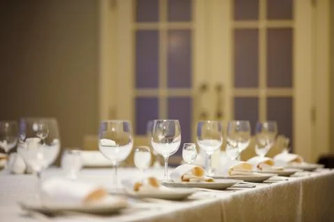 Row of place settings on table for a wedding reception Stock Photos