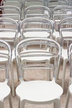 Row of plastic chairs Stock Photos