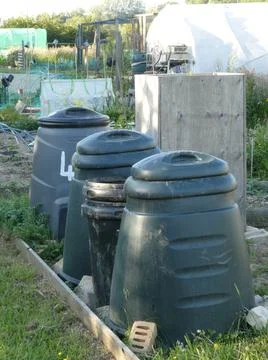 A row of plastic compost bins on a typical allotment Stock Photos
