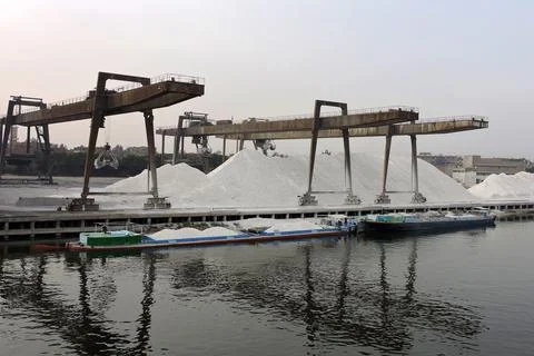 A row of port cranes  Stock Photos
