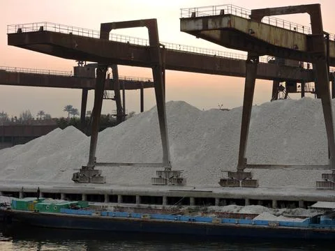 A row of port cranes  Stock Photos