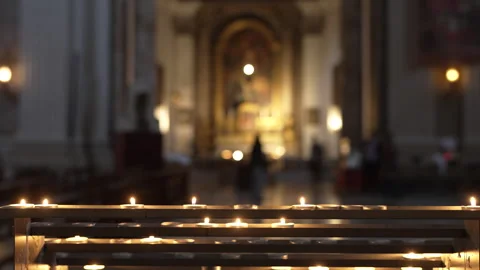 Row of Prayer Candles Inside Historic Church in Rome Stock Footage 345621580