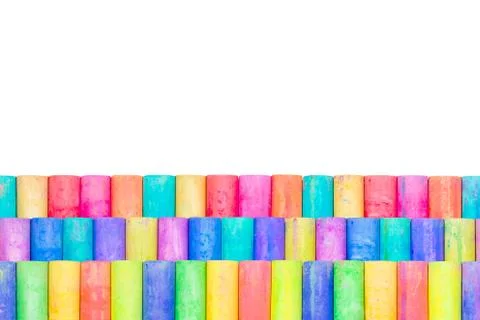 Row of rainbow colored chalk isolate on white background Stock Photos