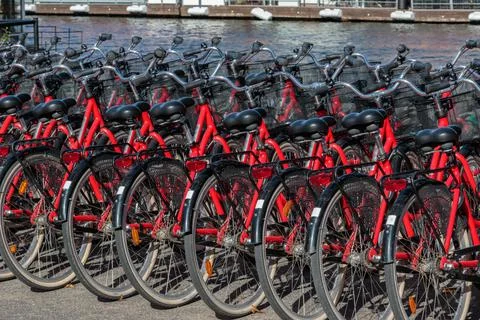 Row of red bikes for bicycle sharing Stock Photos