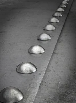 Row of rivets on the metal grunge background Stock Illustration