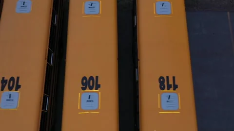 ROW OF SCHOOL BUSES Stock Footage 195118030