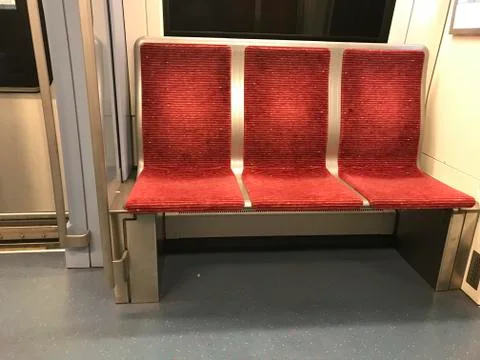 A row of seats in a train Stock Photos